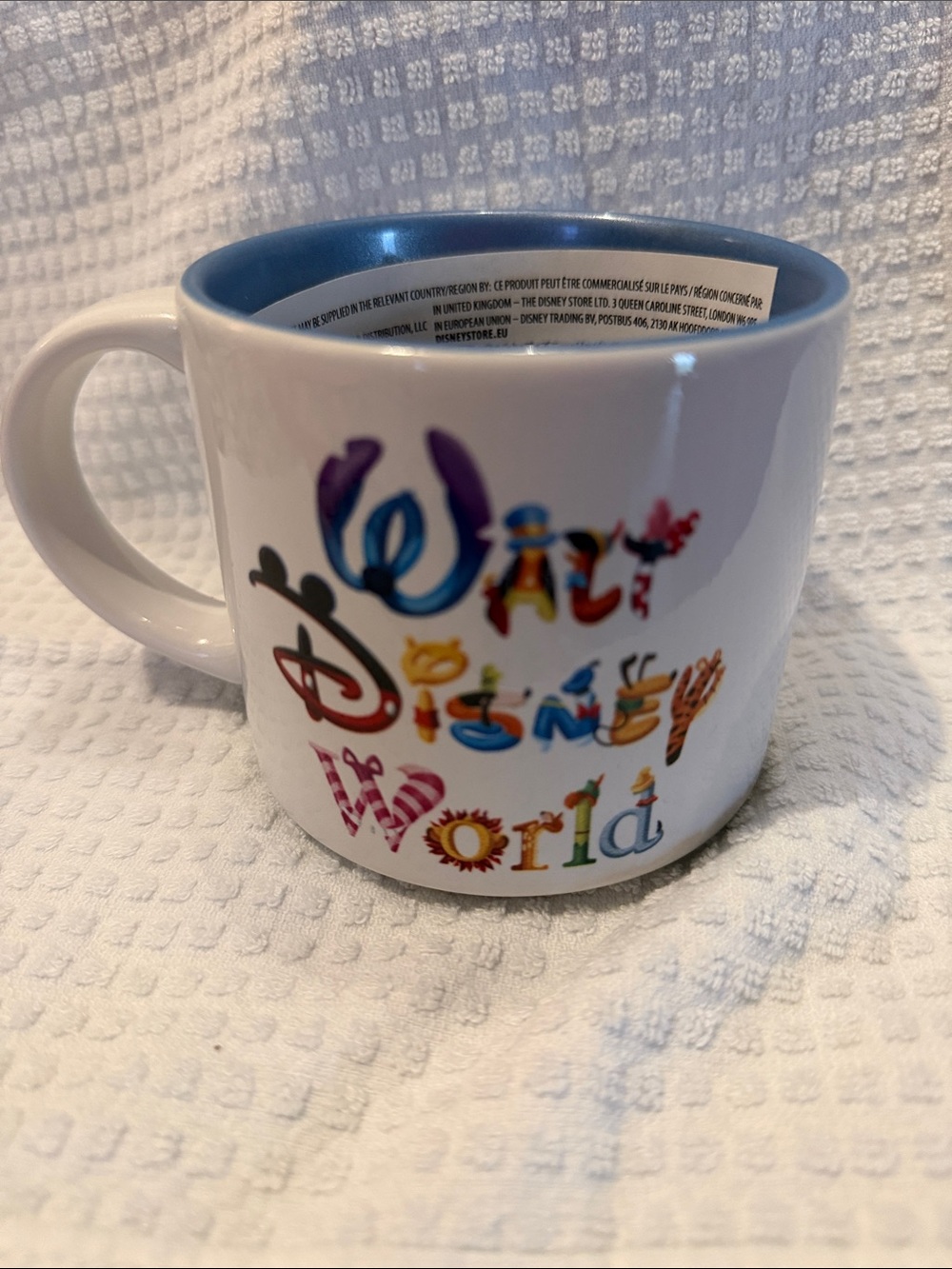 Disney White Mug with Multicolor Walt Disney World Lettering and Blue Rim